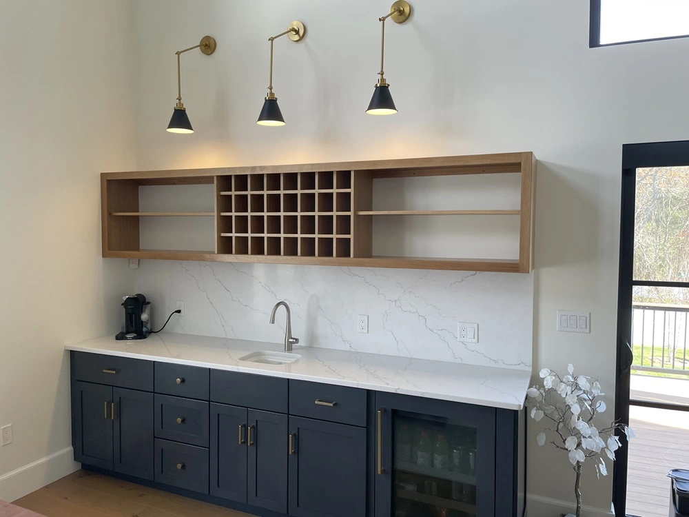 Custom designed wine storage display cabinet in quarter-sawn white oak.